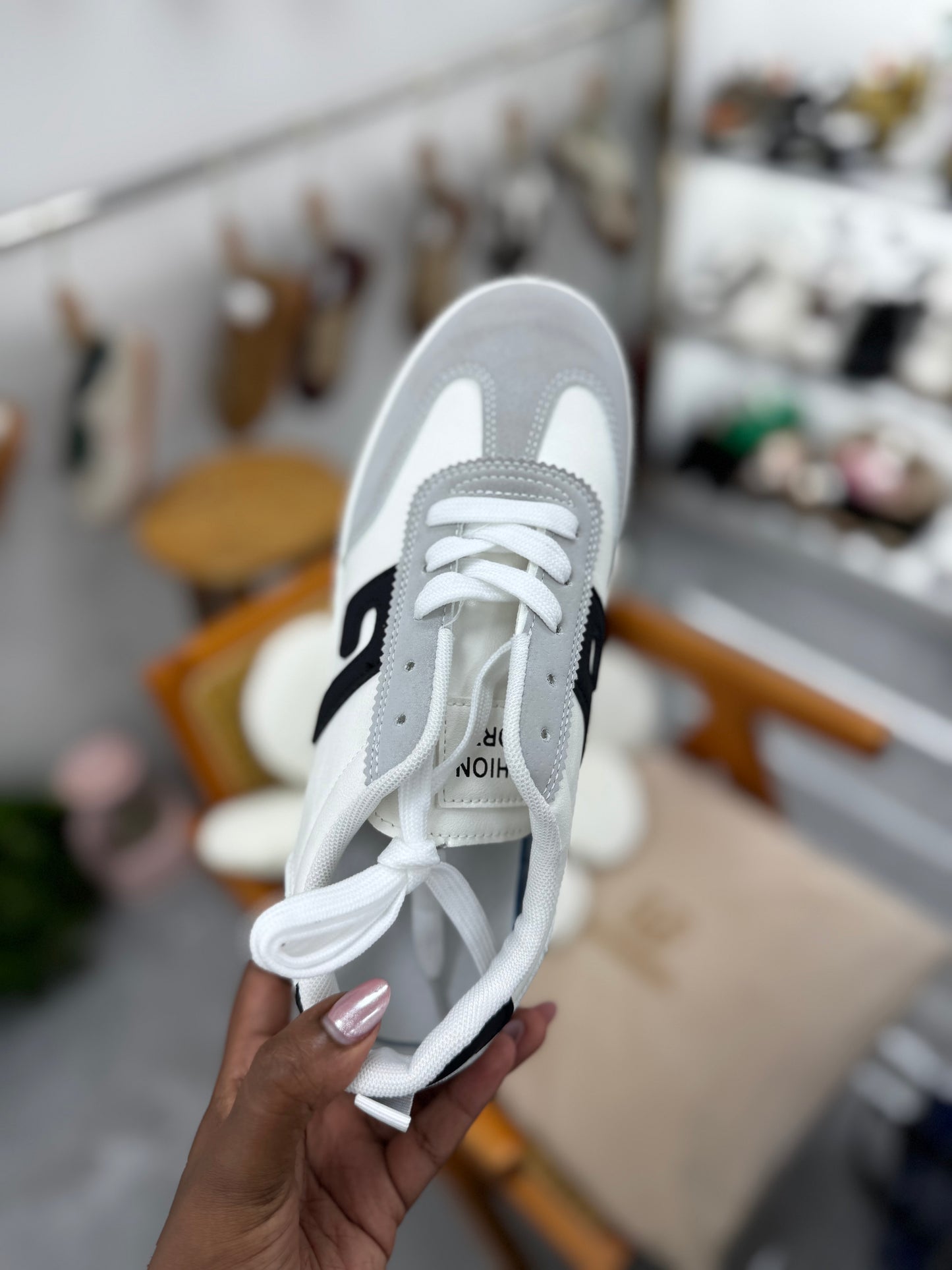 Grey and beige  sneaker with black stripe