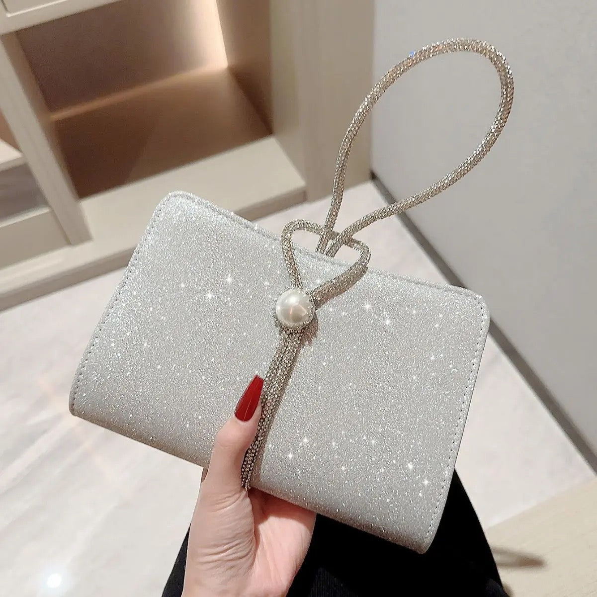 Grace silver clutch bag