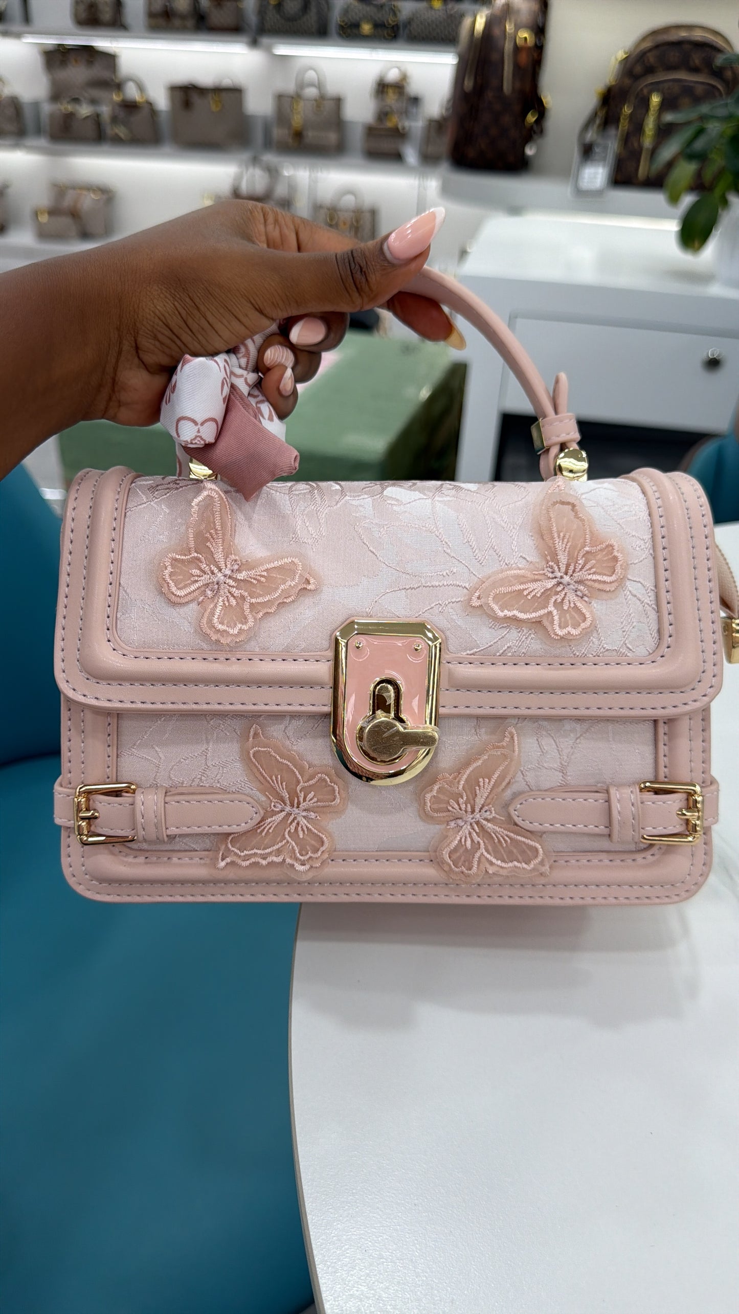 Rumi butterfly crossbody bag