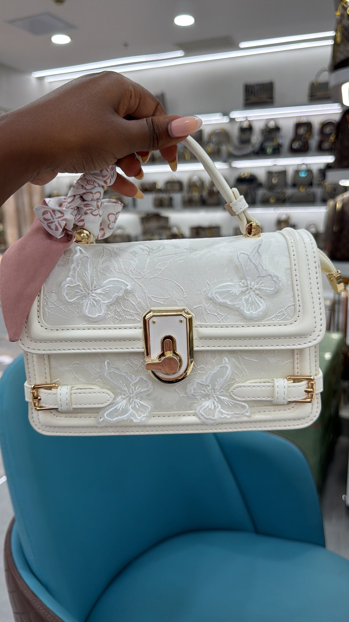 Rumi butterfly crossbody bag