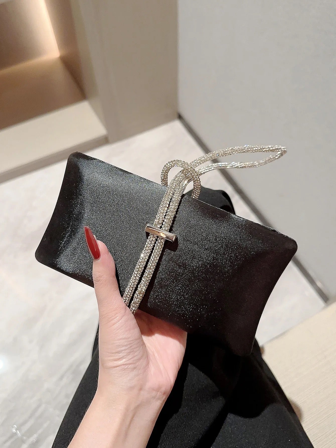 Aria black clutch bag