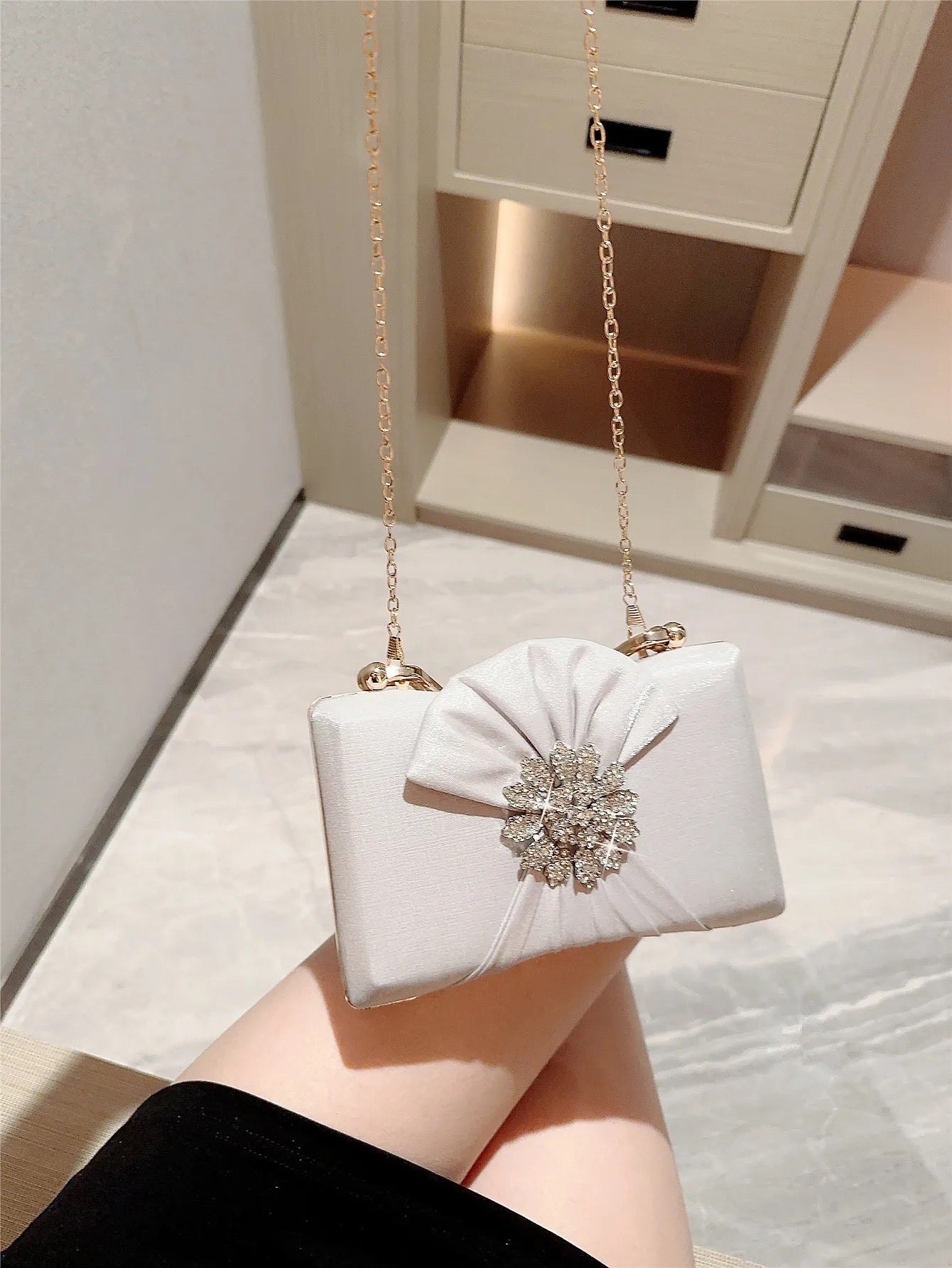 Clara white clutch bag