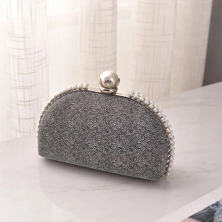 Leo clutch bag