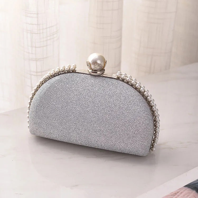 Leo clutch bag